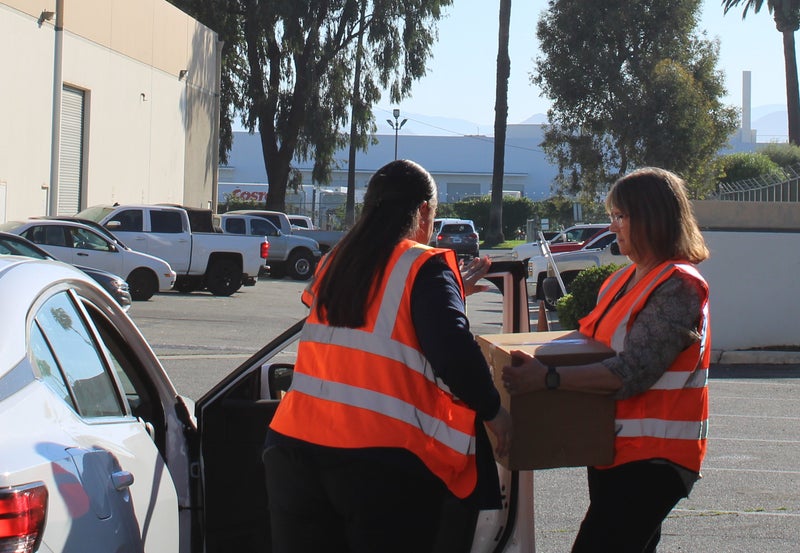Mother's Day Food Distribution: Hams, Fresh Produce, and More - Slide 